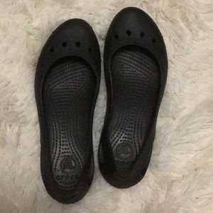 Black Crocs Flats